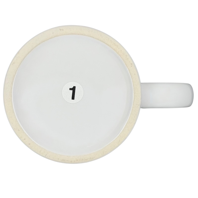 Top view of a white ceramic A Hundred Years From Now mug with a minimalist design and number one detail