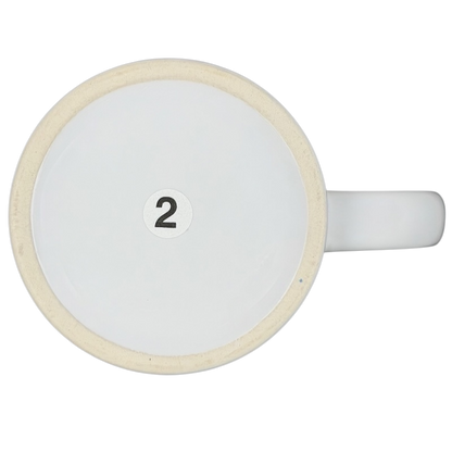 Bottom view of A Hundred Years From Now mug featuring a clean white design with a number 2