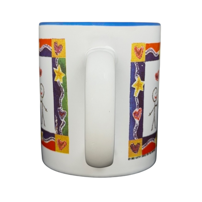 A Hundred Years From Now mug featuring colorful stick figure designs and heart decorations