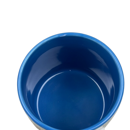 Inside view of A Hundred Years From Now mug featuring blue interior and smooth finish