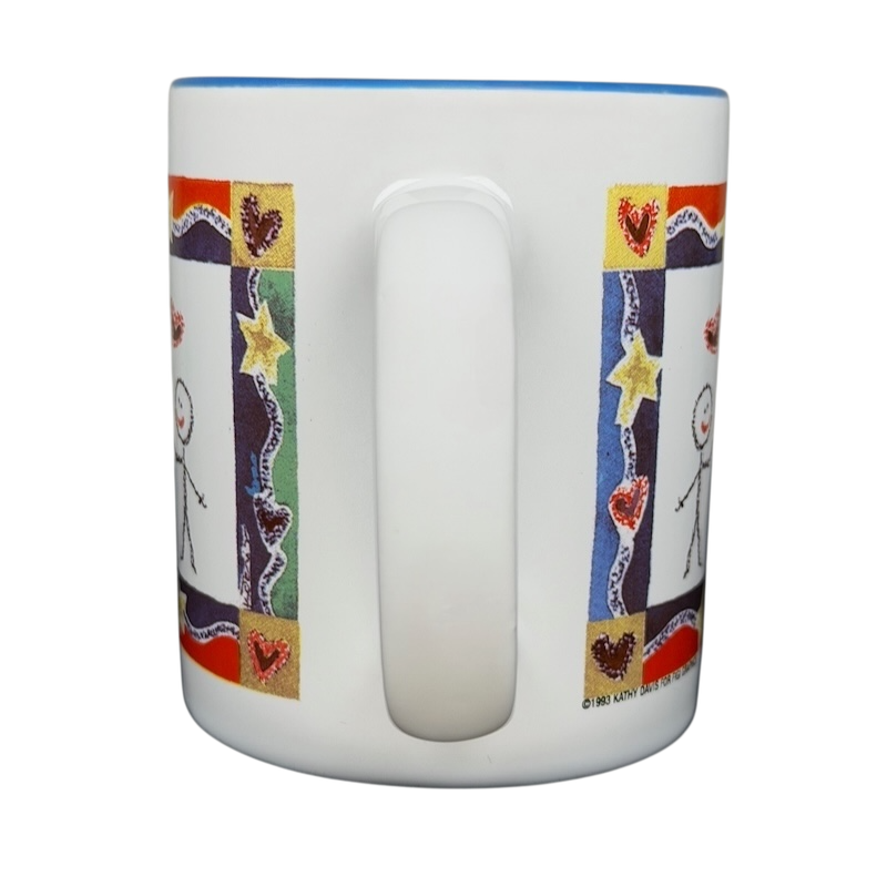 A Hundred Years From Now mug with colorful stick figure design and heart embellishments