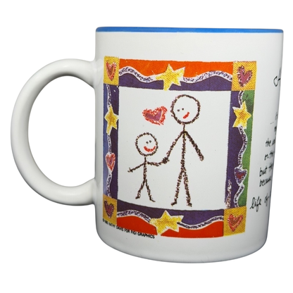 A Hundred Years From Now mug featuring a colorful design with stick figures and hearts