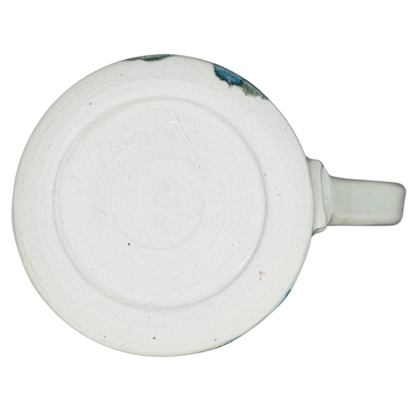 Bottom view of an Abstract Pastel Landscape Signed Pottery Mug showcasing its smooth finish