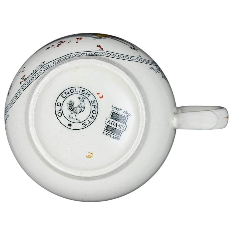 Adams Old English Cock Fighting Mug featuring a detailed design on a white ceramic base