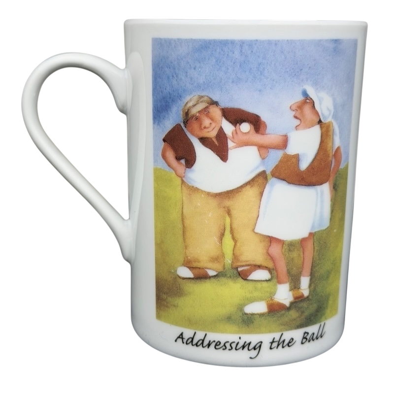 Addressing The Ball Golf Erika Oller Mug featuring two cartoon golfers in a humorous scene