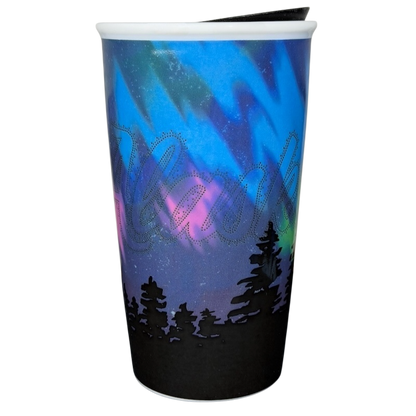 Alaska Northern Lights Starbucks tumbler featuring a vibrant aurora design and silhouette of pine trees