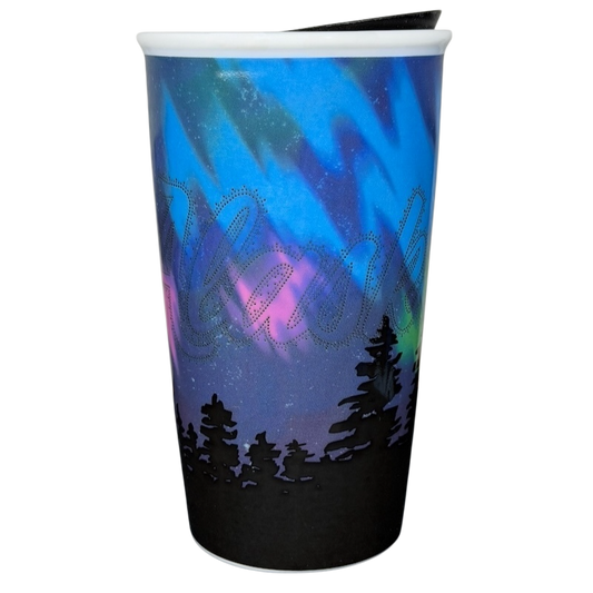 Alaska Northern Lights Starbucks tumbler featuring a vibrant aurora design and silhouette of pine trees