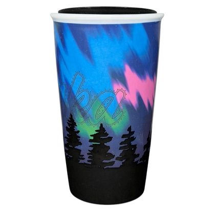 Alaska Northern Lights Starbucks tumbler featuring a vibrant Aurora Borealis design and silhouette of pine trees