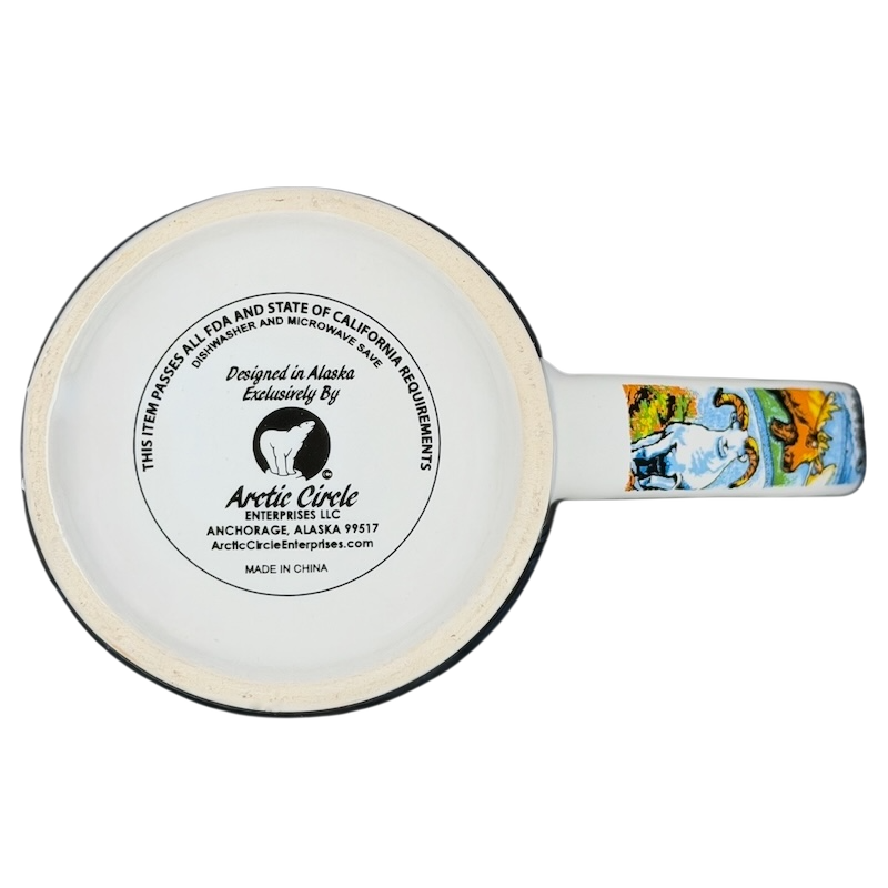 Bottom view of Alaska Wildlife Landmark Collage Mug featuring intricate designs and production details
