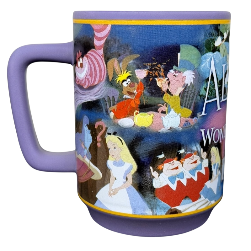 Alice in Wonderland Collage Mug Disney Store featuring vibrant characters and whimsical designs