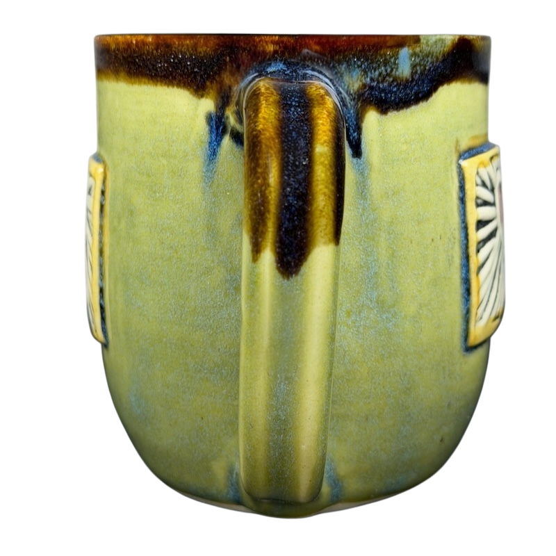 Alissa Clark Clayworks heart mug in green with textured side details and a unique shape