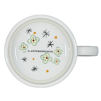 Alexandre Dumas G monogram initial mug white ceramic top view with green floral interior print by Anthropologie
