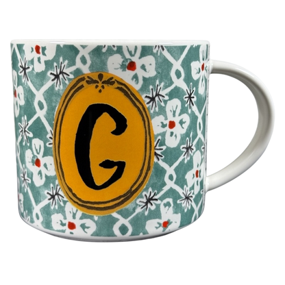 Anthropologie Alexandre Dumas G monogram initial mug green floral ceramic cup with yellow oval monogram