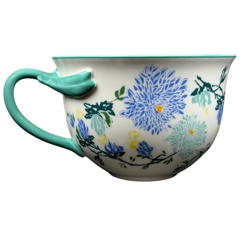 Arboretum Floral Teal Dragonfly Handle Mug Anthropologie with colorful floral design and teal dragonfly handle