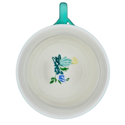 Inside view of Arboretum Floral Teal Dragonfly Handle Mug Anthropologie featuring colorful floral design