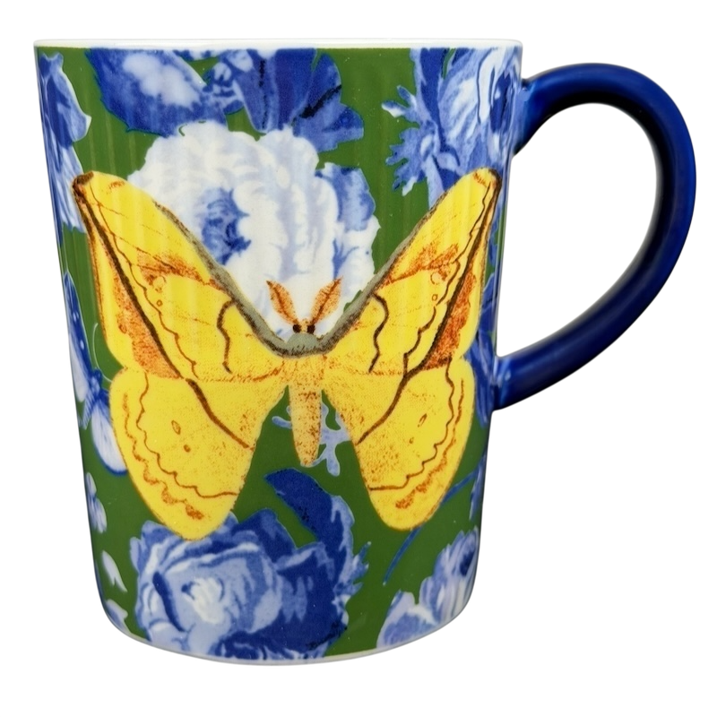 Athalia Butterfly Floral Mug Anthropologie featuring a vibrant yellow butterfly over floral design