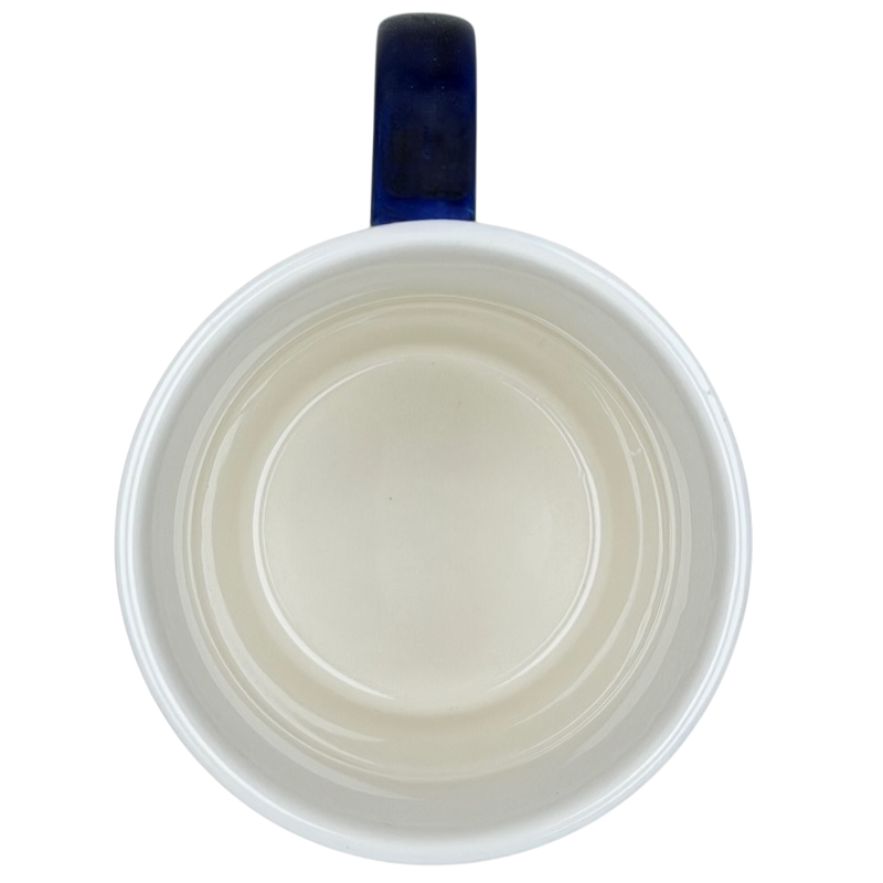 Inside view of the Athalia Butterfly Floral Mug Anthropologie showcasing its smooth, glossy finish