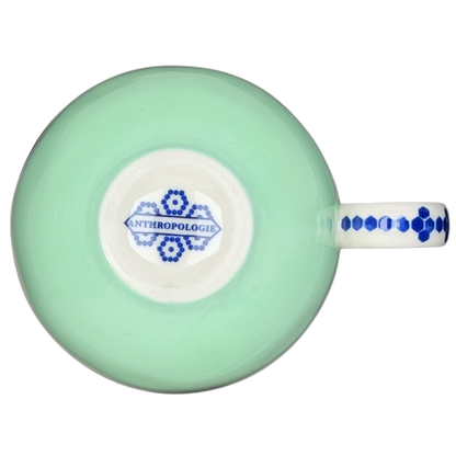 Top view of the Bonjour Pottery Bistro Mug Anthropologie featuring a light green finish and decorative patterns