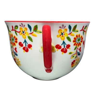 Cadiz Floral Mug Anthropologie featuring vibrant floral designs and a red handle for stylish coffee enjoyment
