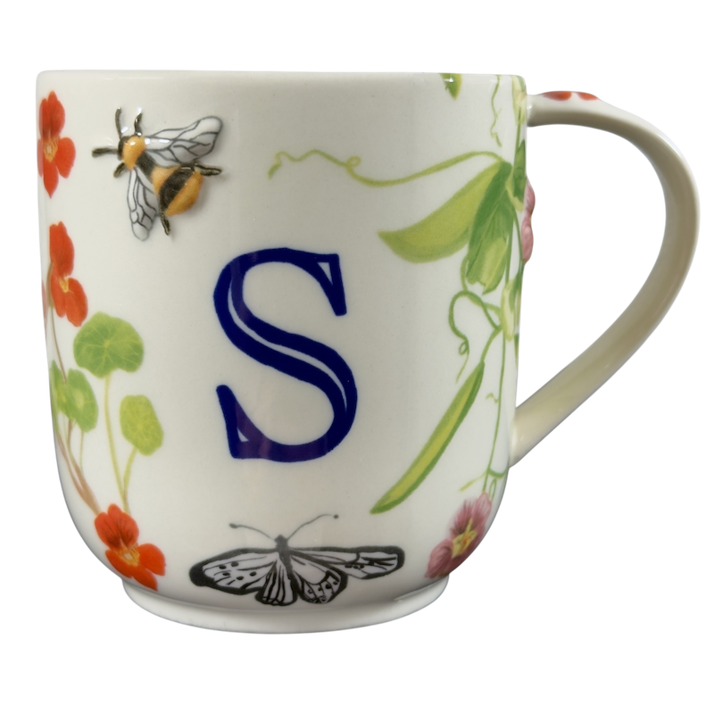 Collectible monogram mug Anthropologie featuring an elegant S design with floral and bee accents