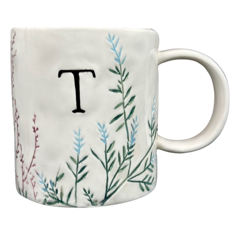Anthropologie Dagny T monogram initial mug with elegant botanical designs and a unique shape