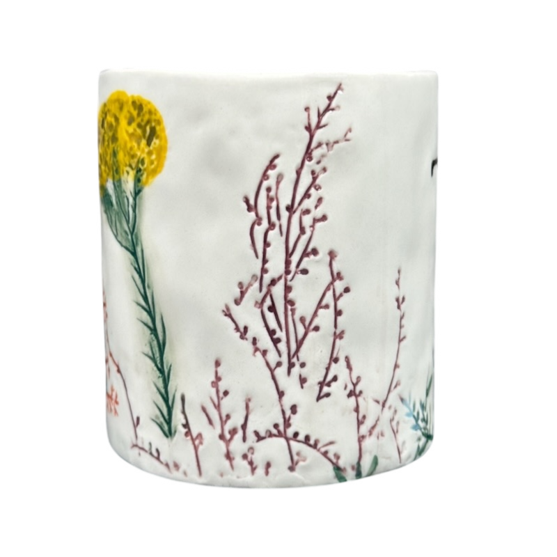 Anthropologie Dagny T monogram initial mug with delicate floral design in yellow and purple hues