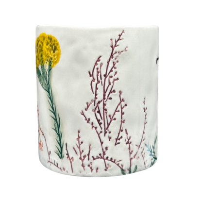 Anthropologie Dagny T monogram initial mug with delicate floral design in yellow and purple hues