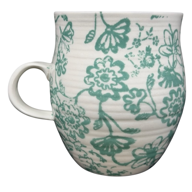 Homegrown Monogram Initial Mug Anthropologie featuring a floral design in teal and cream ceramic