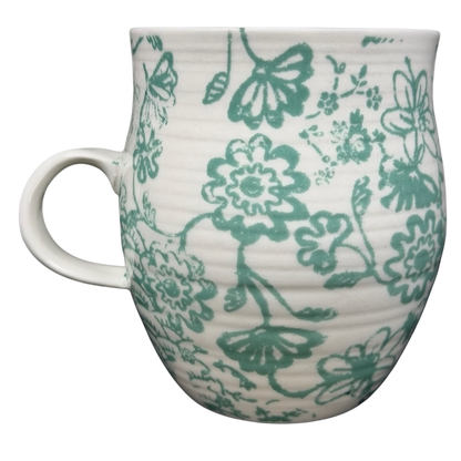 Homegrown Monogram Initial Mug Anthropologie featuring a floral design in teal and cream ceramic