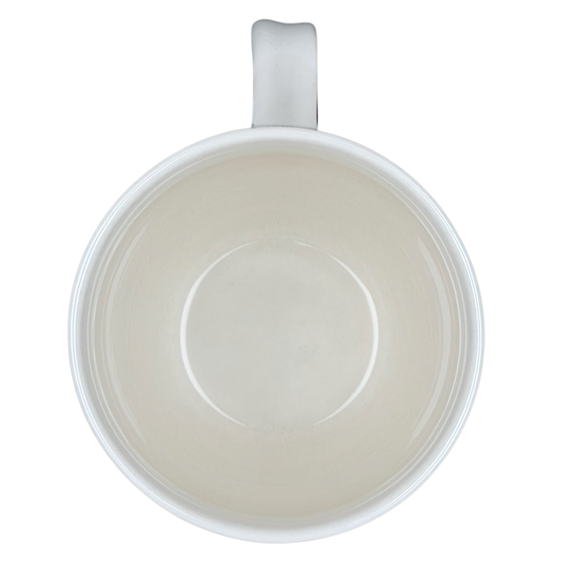 Inside view of the Homegrown Monogram Initial Mug Anthropologie showcasing its smooth, white ceramic finish