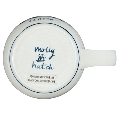 Bottom view of Anthropologie Molly Hatch llama collectible mug showcasing signature and care instructions