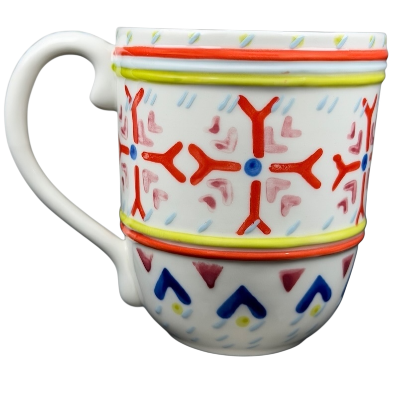 Orkney Northern Snowflakes Mug Anthropologie featuring colorful snowflake patterns and a comfortable handle
