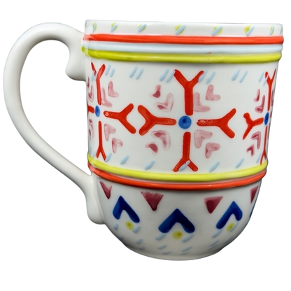 Orkney Northern Snowflakes Mug Anthropologie featuring colorful snowflake patterns and a comfortable handle