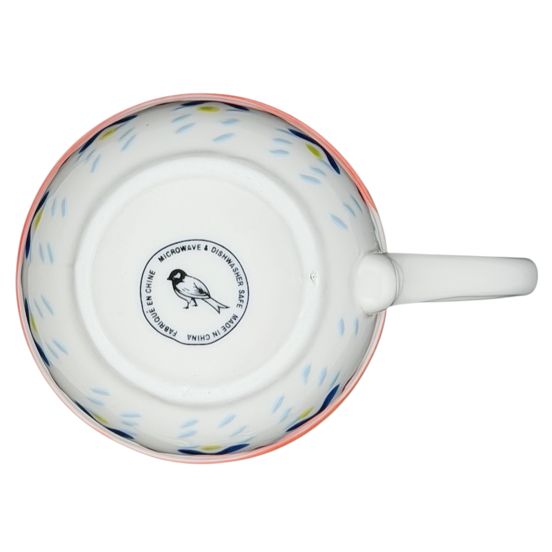 Orkney Northern Snowflakes Mug Anthropologie featuring a colorful design on a white ceramic surface