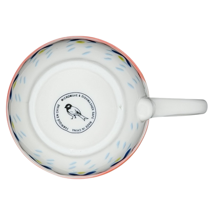 Orkney Northern Snowflakes Mug Anthropologie featuring a colorful design on a white ceramic surface