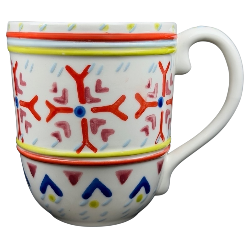 Orkney Northern Snowflakes Mug Anthropologie featuring colorful snowflake designs and a comfortable handle