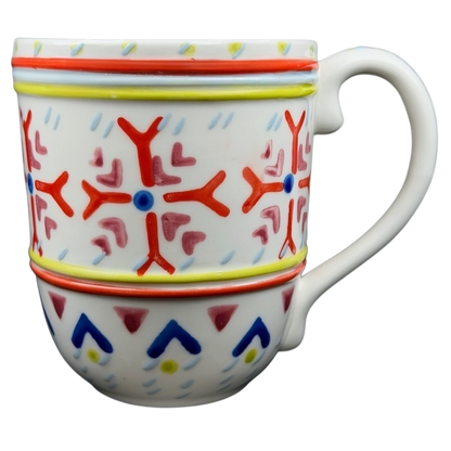 Orkney Northern Snowflakes Mug Anthropologie featuring colorful snowflake designs and a comfortable handle