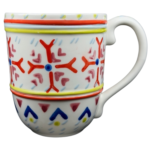 Orkney Northern Snowflakes Mug Anthropologie featuring colorful snowflake designs and a comfortable handle