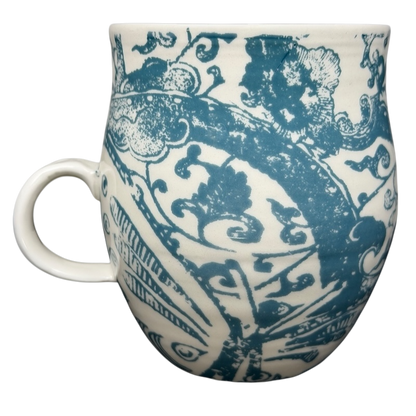 Vintage Anthropologie Homegrown B Mug with intricate blue floral patterns and a comfortable handle