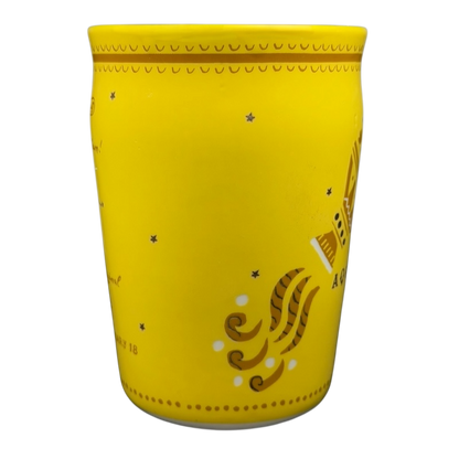AQUARIUS Danielle Kroll Astrology Mug Anthropologie in bright yellow with decorative design