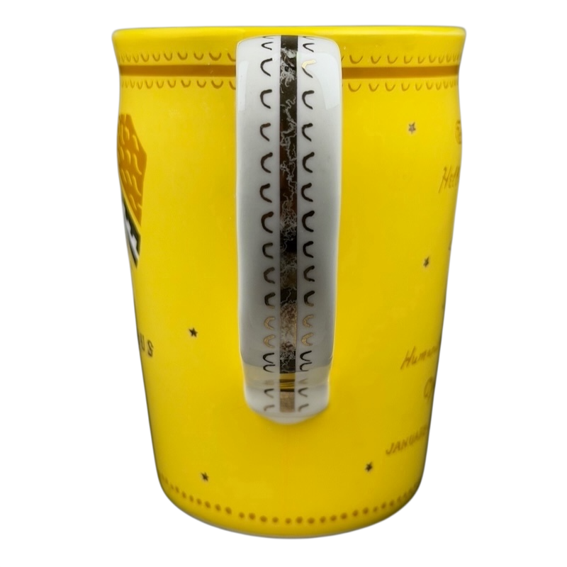 AQUARIUS Danielle Kroll Astrology Mug Anthropologie in bright yellow with a decorative handle