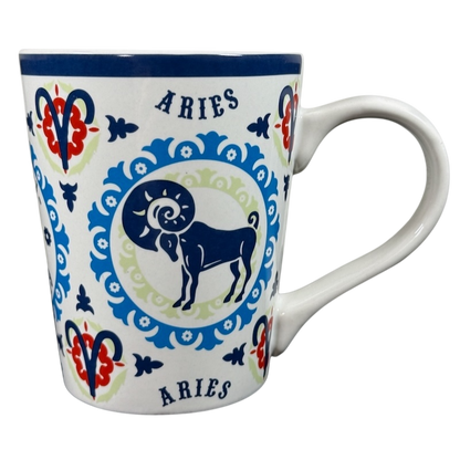 Aries zodiac Fisher mug with ram design and decorative blue and red patterns on white ceramic