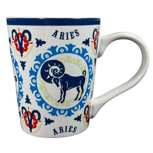 Aries zodiac Fisher mug with ram design and decorative blue and red patterns on white ceramic