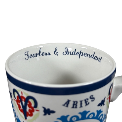 Aries zodiac Fisher mug with fearless and independent text and decorative blue and red design