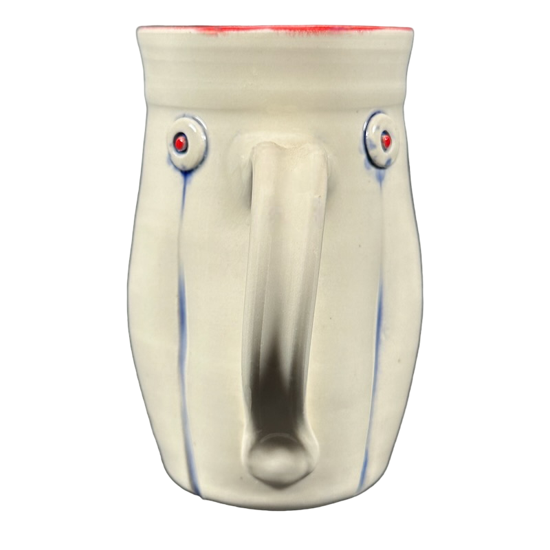 Rebecca Lowery embossed pottery mug front view cream ceramic mug with red rim and blue vertical accents