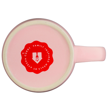 Bottom view of Love You A Latte FabFitFun Mug Ayesha Curry with a pink finish and logo