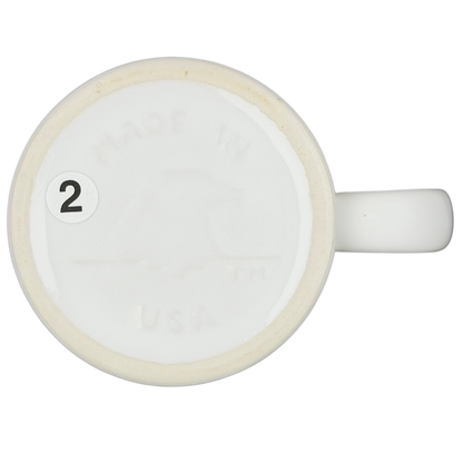 Bottom view of a vintage mug marked Made in USA, featuring Barack Obama birth certificate design