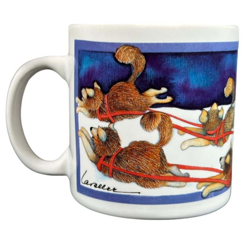 Barbara Lavallee Inuit family sledding mug featuring a colorful illustration of sled dogs in action