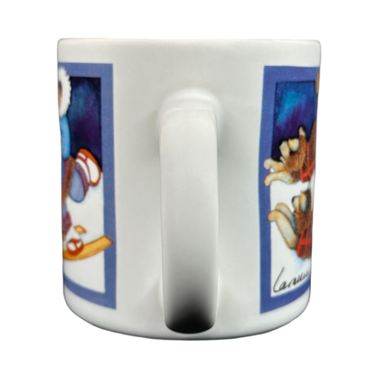 Barbara Lavallee Inuit family sledding mug featuring colorful Inuit artwork on two sides