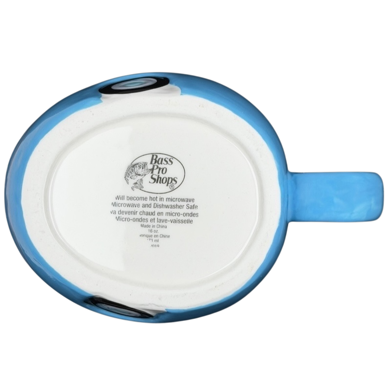 Bottom view of the Happy Camper blue RV Bass Pro Shops mug with care instructions